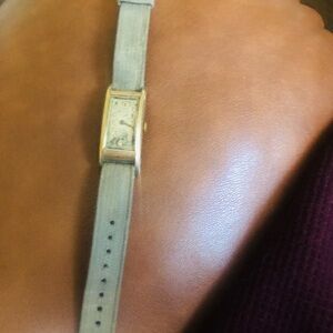 Elegant Gold Watch with Blue Strap